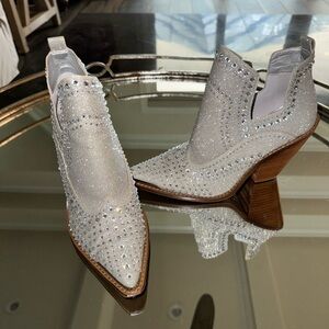 Silver ankle boots with rhinestones only worn 1 time in great condition.
